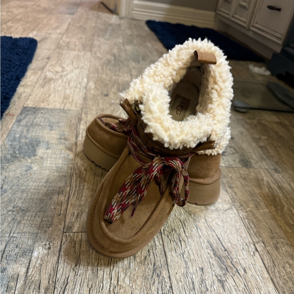 Tan, fur lined boots. Worn once!